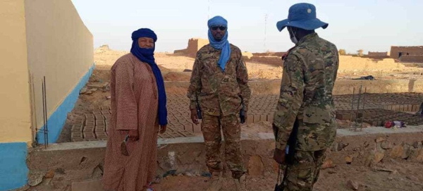 Captain Abdelrazakh (center) was deployed at the Aguelhok Super Camp in northeast Mali when it was attacked by an armed terrorist group.
