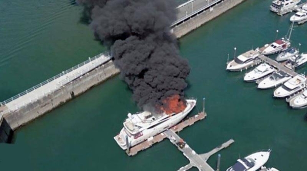 Flames and smoke were seen pouring from the superyacht in Torquay marina.
