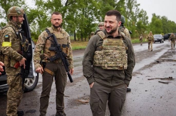 Zelenskyy’s office posted a video on Telegram of him wearing a bullet-proof vest and being shown heavily destroyed buildings in Kharkiv and its surroundings on Sunday. (Ukrainian Presidential Press Office)