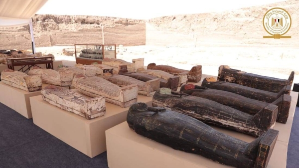 A large trove of ancient bronze statues and colored sarcophagi discovered in Egypt's Saqqara was revealed to the public on Monday.