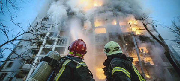 A residential building burns after being shelled in Kiev, Ukraine. Two people died and fifty people were rescued by Ukraine emergency workers. — courtesy  UNDP Ukraine/Pavlo Petrov