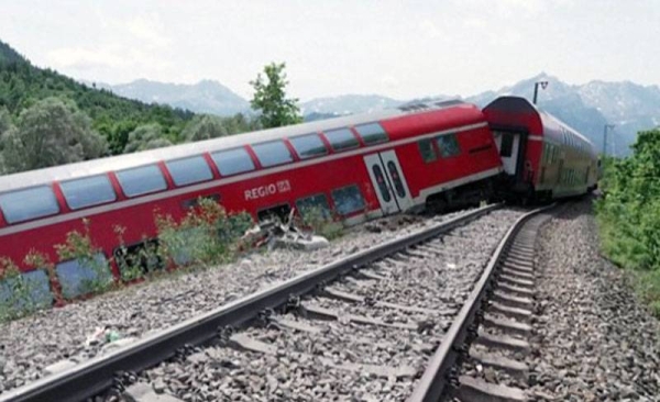 Picture shows derailed German train after deadly accident in Bavaria.