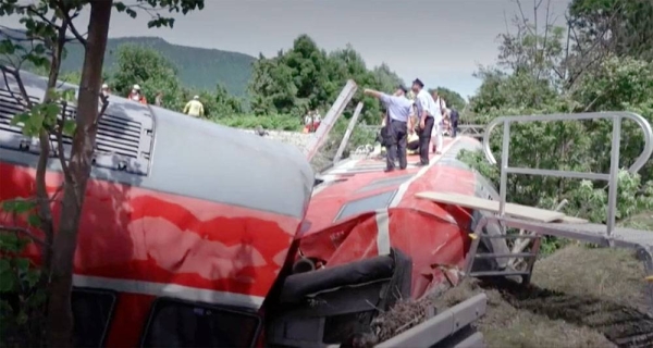 Picture shows derailed German train after deadly accident in Bavaria.