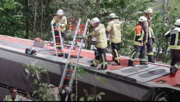 Picture shows derailed German train after deadly accident in Bavaria.