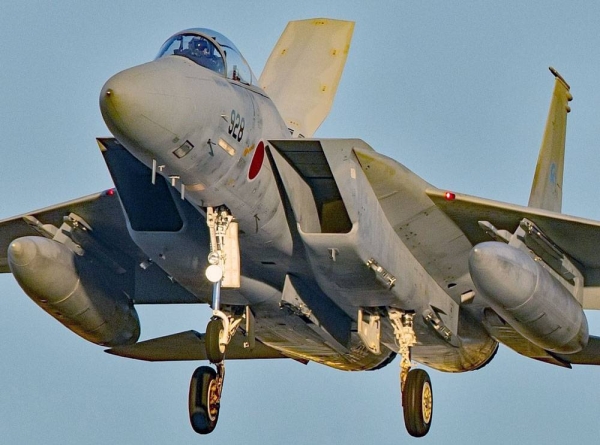 Photo taken on Tuesday, shows three F-15 fighter jets (front) of the Japanese Air Self-Defense Force and two F-16s of the US Air Force during a joint drill. — courtesy Kyodo