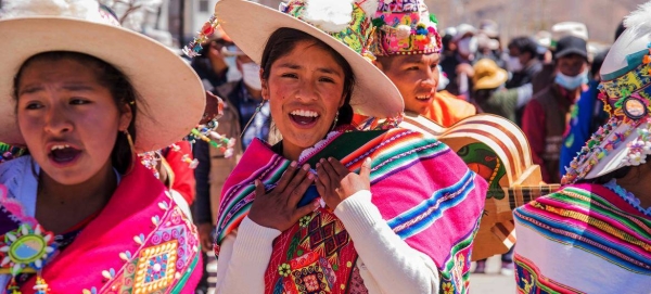 Young indigenous girls dancing a typical dance in rural Bolivia, October 2021