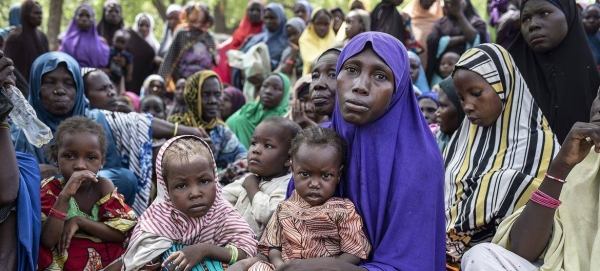 Internally displaced mothers with their children attend a WFP famine assessment exercise in Borno State, northeastern Nigeria.
