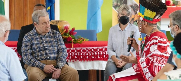 UN Secretary-General António Guterres (center) meets with members of agricultural cooperatives led by indigenous women and men in Pierre Kondre- Redi Doti Village, in Suriname's tropical forest belt. — courtesy UN News/Laura Quiñones