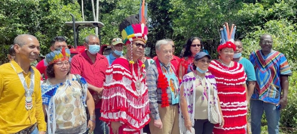 UN Secretary-General António Guterres (center) meets with members of agricultural cooperatives led by indigenous women and men in Pierre Kondre- Redi Doti Village, in Suriname's tropical forest belt. — courtesy UN News/Laura Quiñones