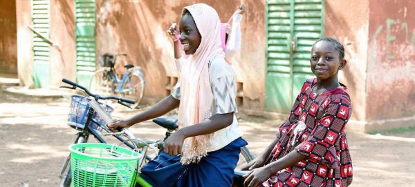 Children ride a bike in Fada, Burkina Faso. — courtesy UNICEF/Frank Dejongh