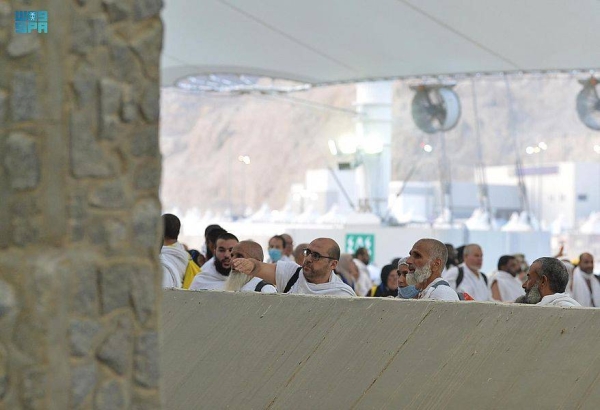 Pilgrims performed stoning ritual on Sunday, the first day of Tashreeq, at Jamarat in Mina. Wearing normal dress after exiting from ihram the previous day, they threw pebbles at all the three Jamarat or pillars symbolizing Satan.