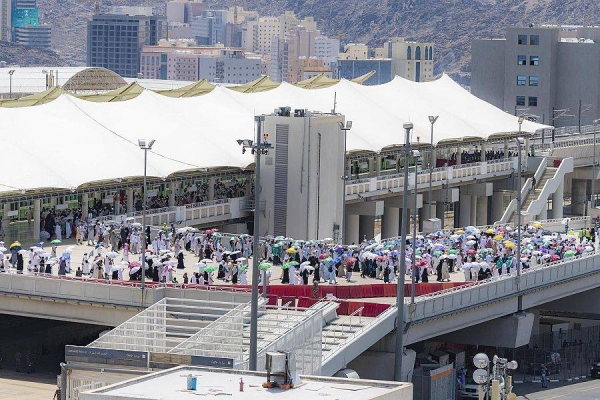 Pilgrims performed stoning ritual on Sunday, the first day of Tashreeq, at Jamarat in Mina. Wearing normal dress after exiting from ihram the previous day, they threw pebbles at all the three Jamarat or pillars symbolizing Satan.