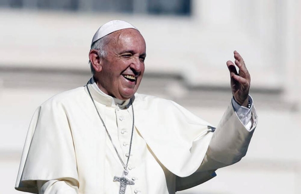 Pope Francis gestures as he leaves his general audience in St. Peter's Square at the Vatican Oct. 11, 2017, in this file photo.