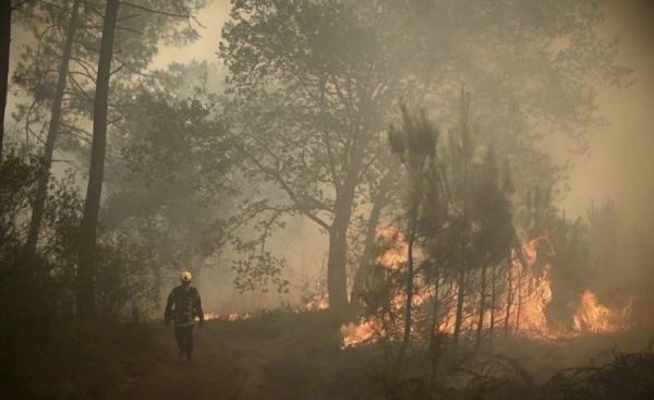 Europe broils in heat wave that fuels fires in France, Spain