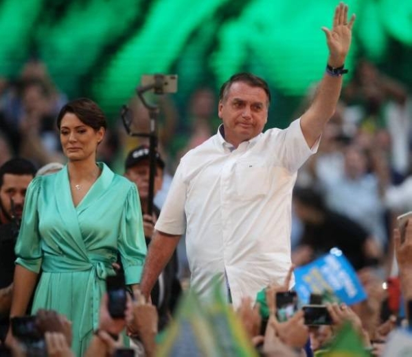 Brazil's President Jair Bolsonaro, along with his wife Michelle, attends the launching ceremony to officially become a candidate for the presidential re-election, in Rio de Janeiro.