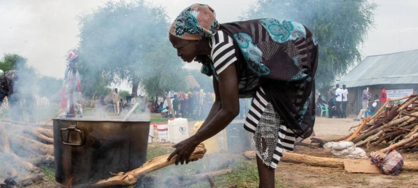 A woman in Sudan cooks meals for school children in Walgak, Jonglei State. 