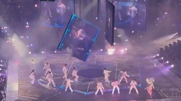 Graphic video shared online showed the moment the screen fell onto the stage.