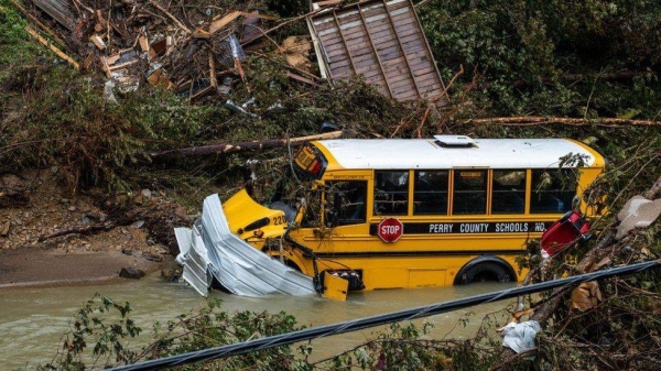 A school bus sits in a creek following heavy rains near the city of Jackson.