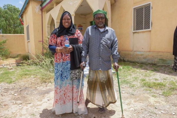 UNSOM Human Rights Officer Ms SIA Mawalla, pose for a photo with a representative of civil society in Erigavo, Sanaag region.