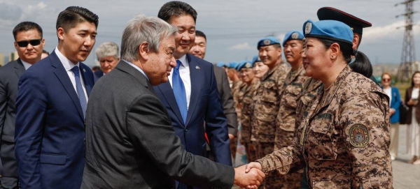 Secretary-General António Guterres greets Mongolian peacekeepers which has the largest per capita contribution to peacekeeping operations.