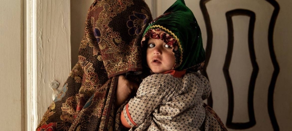 A mother and her child inside a medical clinic in Kandahar, Afghanistan.