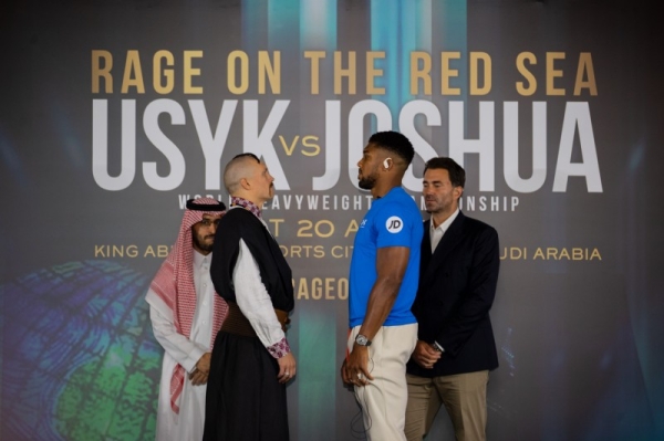 Amid singing, dancing and deep talk, Usyk and Joshua address pre-fight press conference