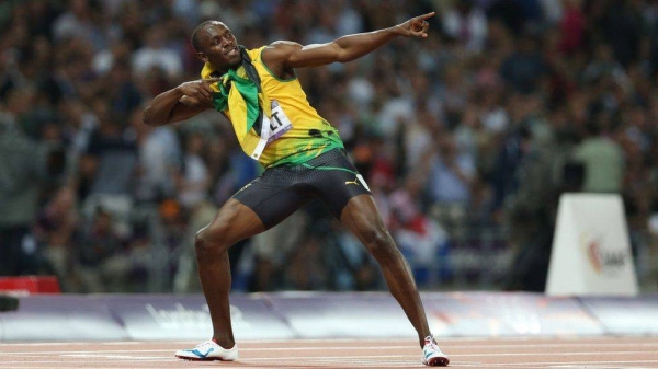 Usain Bolt celebrates after he wins gold during the Men's 200m final at the London 2012 Olympic Games.