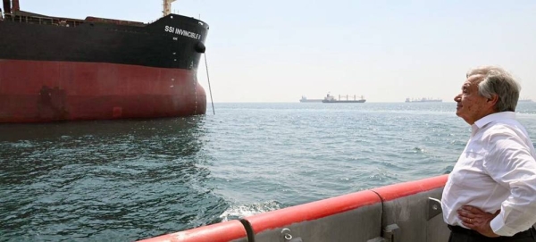 

In Istanbul, UN Secretary-General António Guterres observes the WFP ship SSI Invincible 2, headed to Ukraine to pick up the largest cargo of grain yet exported under the Black Sea Grain Initiative. — courtesy UN Photo/Mark Garten