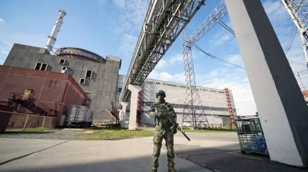A Russian serviceman guards in an area of the Zaporizhzhia Nuclear Power Station in territory under Russian military control, southeastern Ukraine in this file photo.