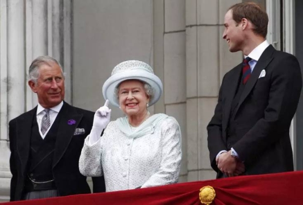 File photo shows, from left, Britain's Prince Charles, Queen Elizabeth II & Prince William on the balcony at Buckingham Palace during Diamond Jubilee celebrations June 2012.