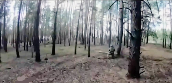 A Ukrainian soldier advances toward the Russian border in the Kharkiv region, Ukraine.