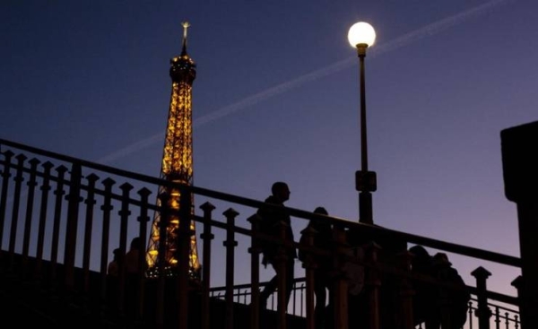 Mayor Anne Hidalgo said the iconic tower that is normally illuminated until 1 a.m. is only one of the city’s monuments and municipal buildings that will be plunged into darkness earlier in the evening.