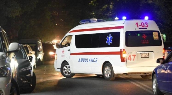 An ambulance moves on a street near a military hospital in Yerevan, Armenia, following night border clashes on September 13.