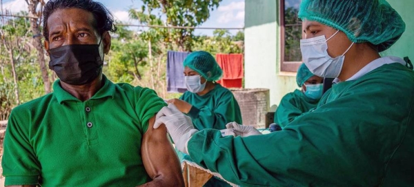 Residents in Kupang, Indonesia, receive COVID-19 vaccines donated by the COVAX facility (file). — courtesy UNICEF/Fauzan Ijazah