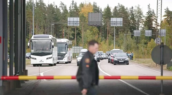 Buses and cars queue to cross the border from Russia to Finland at the Vaalimaa border check point in Virolahti, Finland, Friday. — courtesy photo
