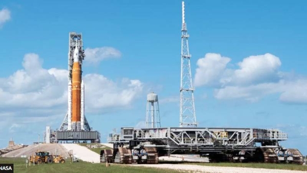 The Crawler Transporter will take the SLS rocket back to its assembly building. — courtesy NASA