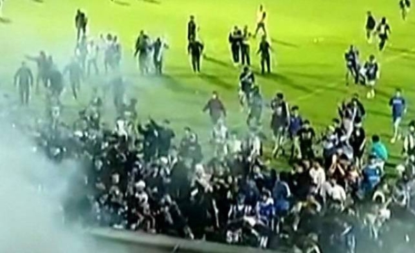 Scores killed at Indonesia football match.