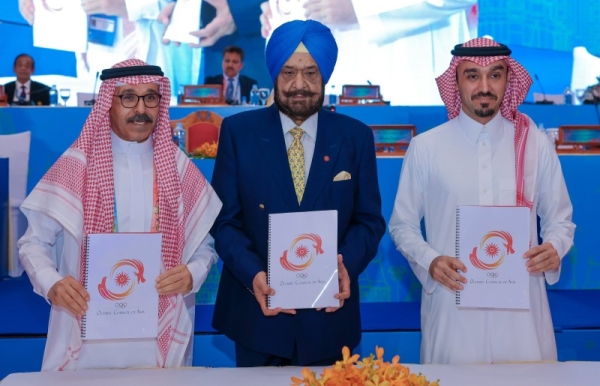 Saudi Olympic & Paralympic Committee (SOPC) President Prince Abdulaziz bin Turki Al-Faisal, NEOM CEO Nadhmi Al-Nasr and with Acting OCA President Raja Randhir Singh after signing the host city contract.