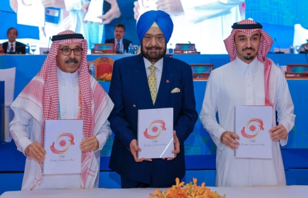 Saudi Olympic & Paralympic Committee (SOPC) President Prince Abdulaziz bin Turki Al-Faisal, NEOM CEO Nadhmi Al-Nasr and with Acting OCA President Raja Randhir Singh after signing the host city contract.
