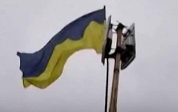 Flags being raised in retaken areas of Ukraine.