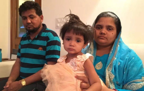 Bilkis Bano with her husband Yakub Rasool and one of their children.