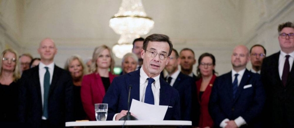 Prime Minister Ulf Kristersson introduces the new government ministers during a news conference in Stockholm, Sweden. — courtesy TT