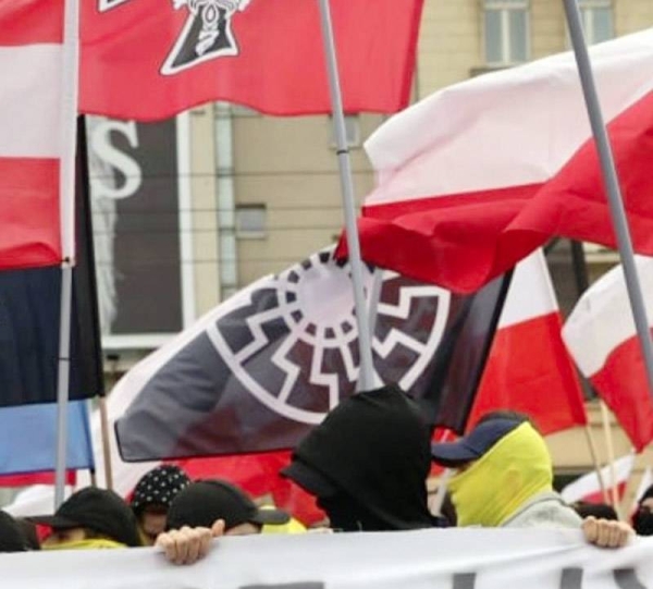 Participants display the “Black Sun” symbol during the nationalist rally in Warsaw, with the police not intervening. — courtesy Twitter