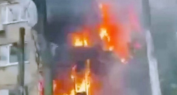A still taken from a video of a building burning — courtesy office of the president of Ukraine