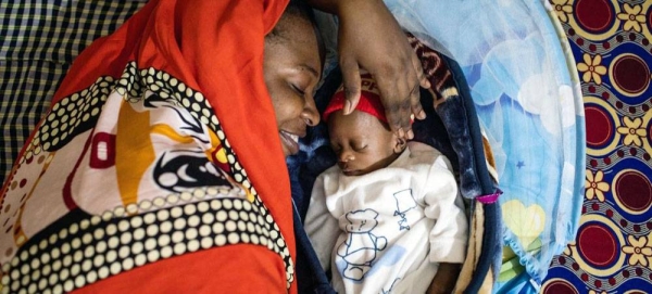 Through UNICEF’s mother support programs, Mbene practised skin-to-skin contact & breastfeeding methods to help her premature babies grow healthy at home. — courtesy UNICEF