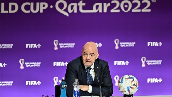 Infantino speaking to a news conference in the Qatari capital.