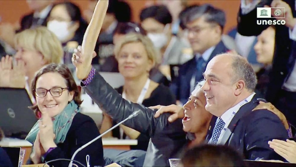 The French delegation cheers wildly after UNESCO made the French baguette part of the Intangible Cultural Heritage of Humanity.