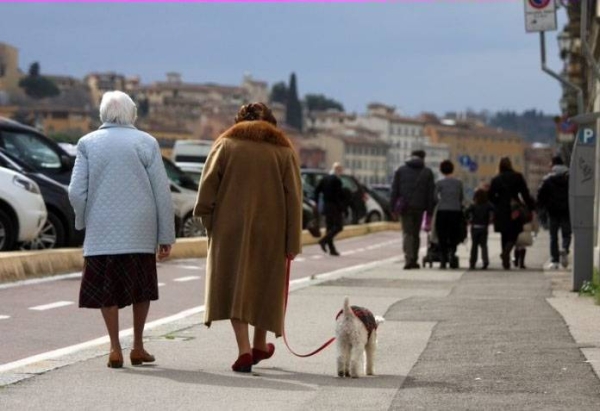 Locals take time out to walk in Italy, as report of the country’s population dropping is released.