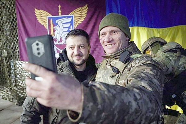 A Ukrainian soldier takes a selfie with President Volodymyr Zelenskyy on his visit to Sloviansk. — courtesy Ukrainian Presidential Press Office