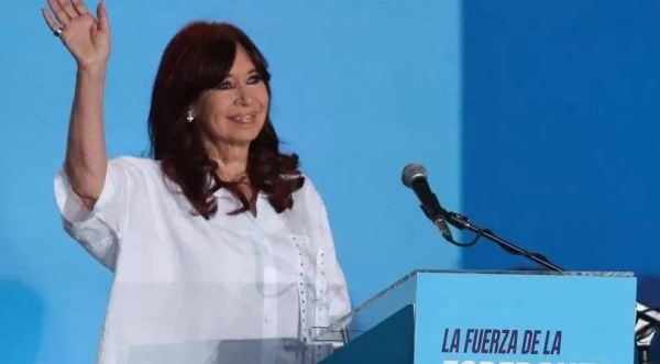 Cristina Fernandez de Kirchner waves as she attends a party rally in La Plata, on the outskirts of Buenos Aires